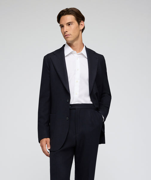 Traje azul de sarga de lana jersey